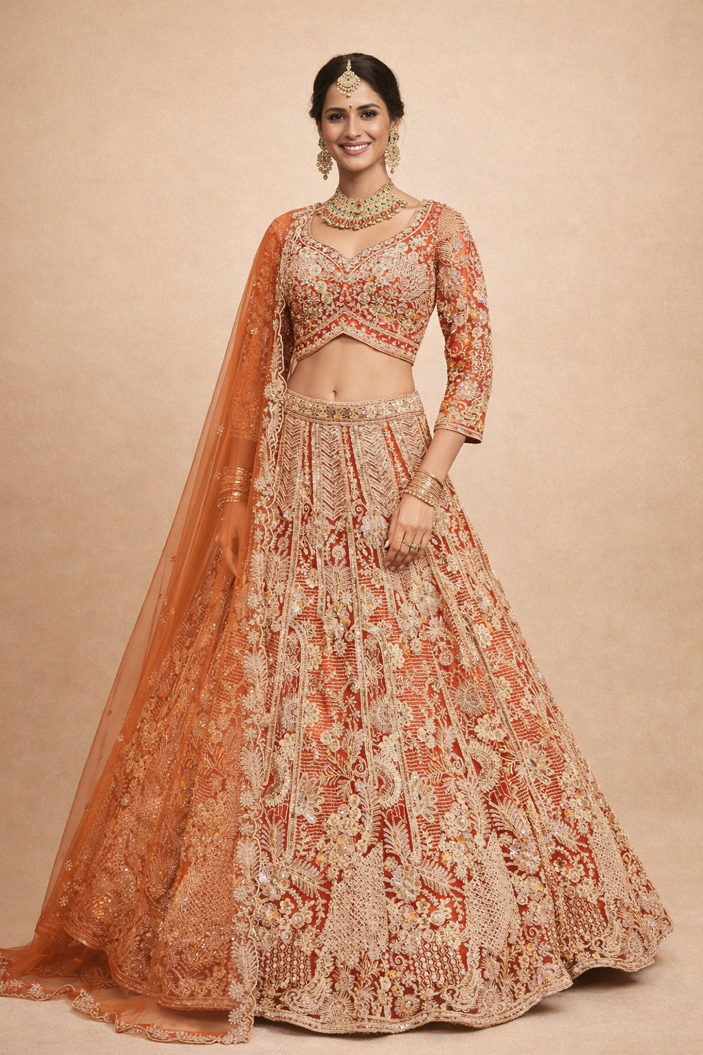 UMA SUTRA Designer Bridal Lehenga – Orange & Gold Embroidered Wedding Wear