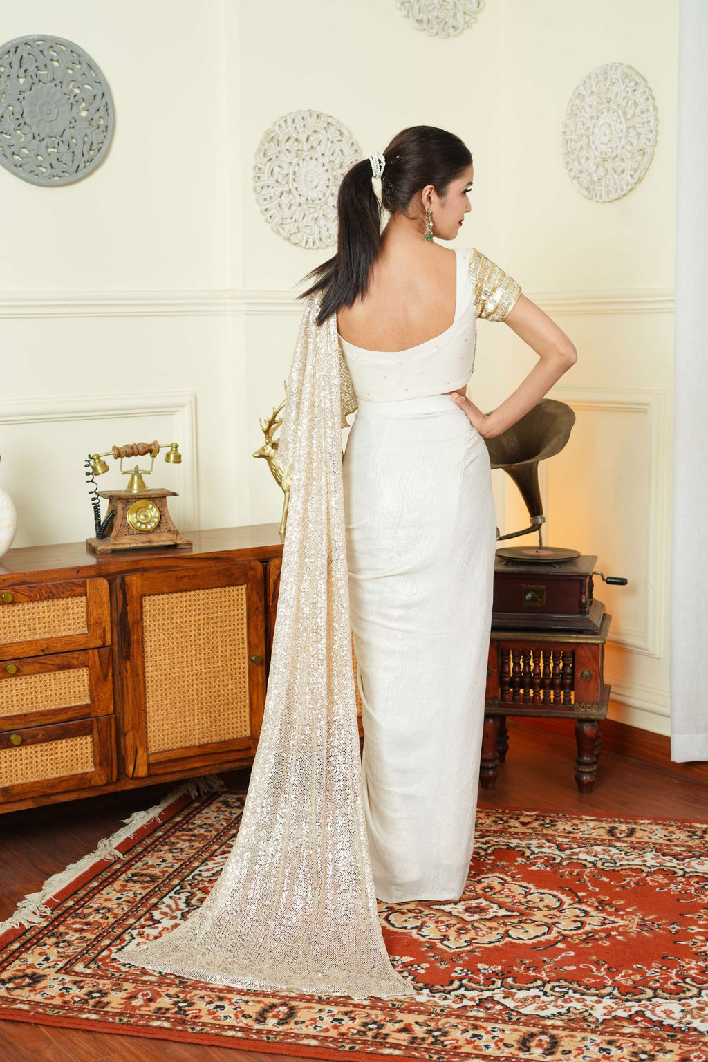 UMA SUTRA Golden Dual Tone Drape Saree back view