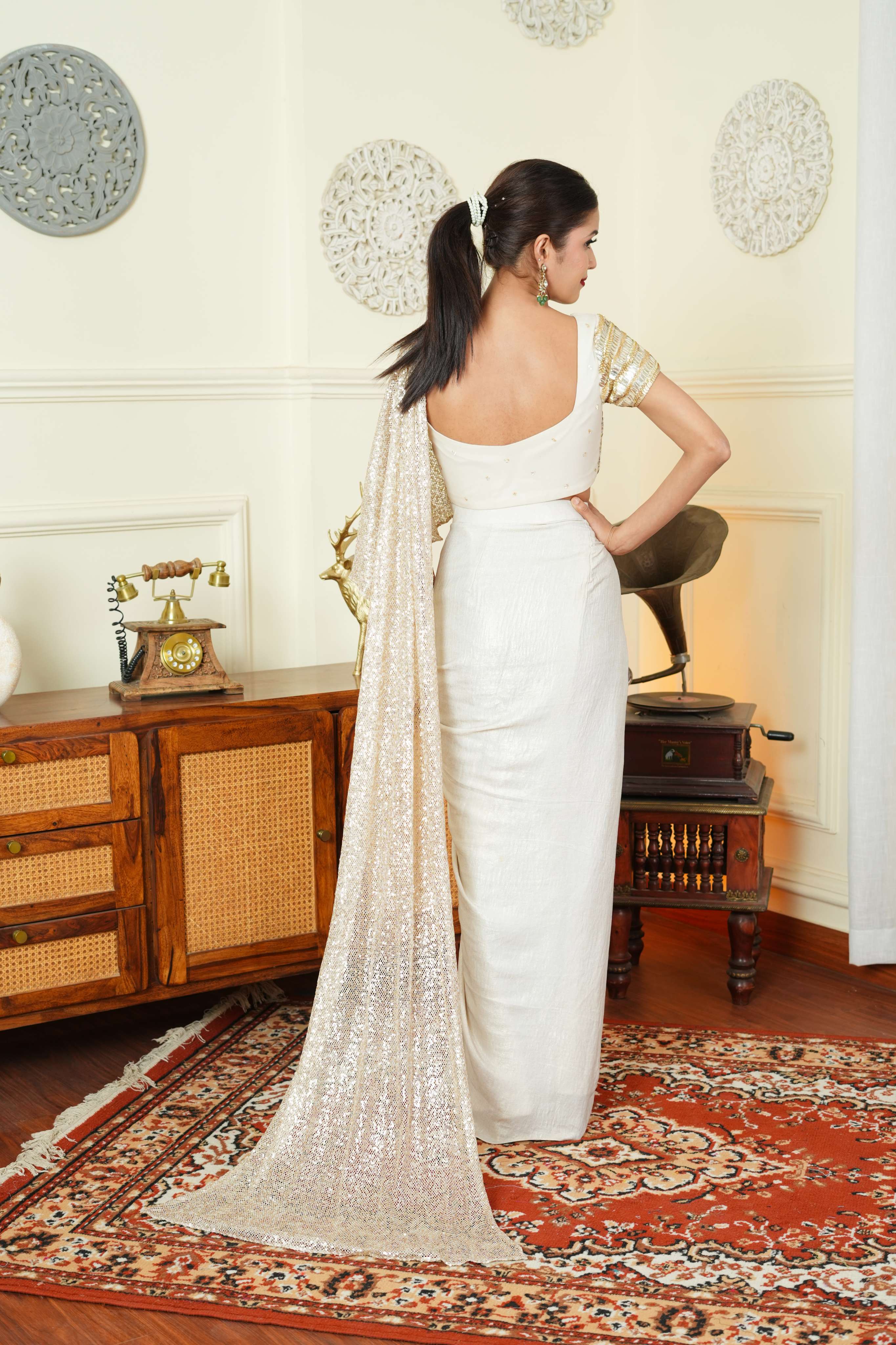 UMA SUTRA Golden Dual Tone Drape Saree back view