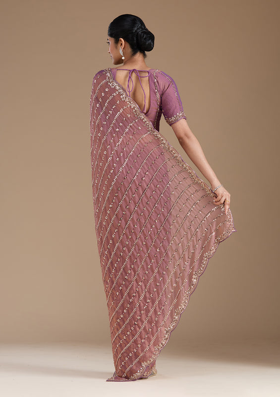 Uma Sutra cutdana work tissue saree back view 
