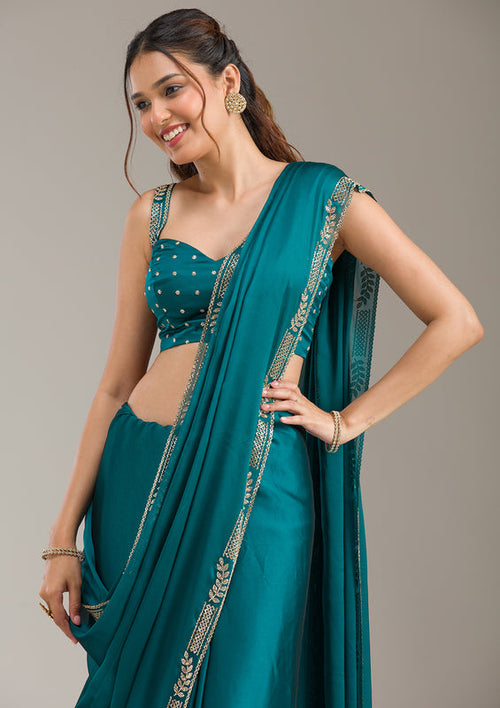 Georgette fabric Saree with Stonework (Gold) embroidery by UMA SUTRA 