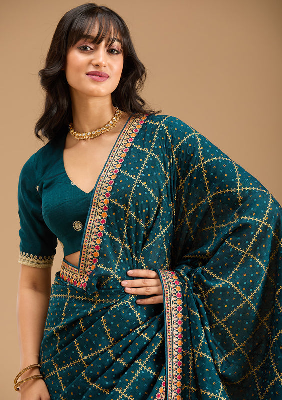 Uma Sutra silk saree green 